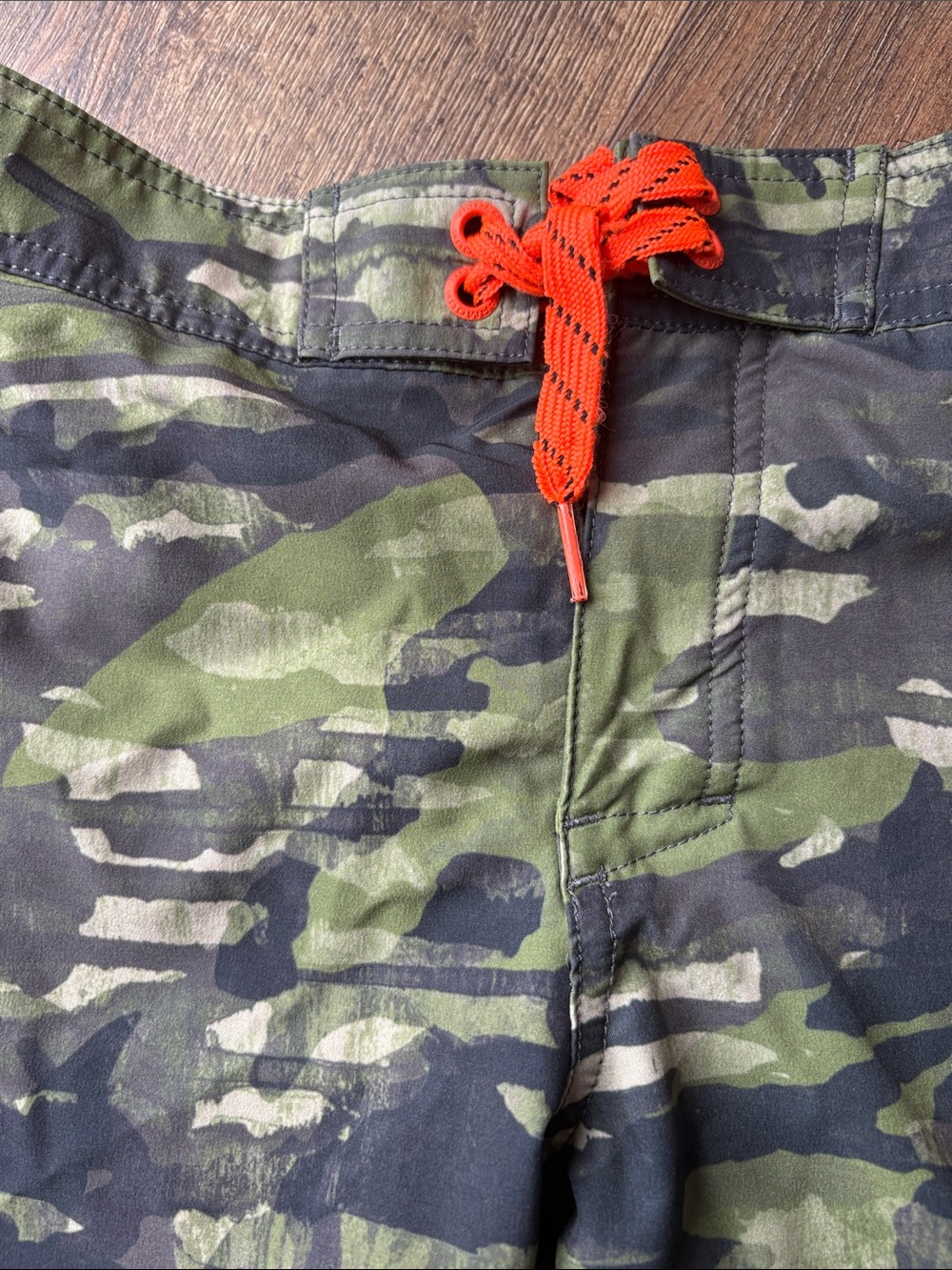 Under Armour Boys Camo Swim Shorts with Bright Orange Accents - Picture 3 of 6